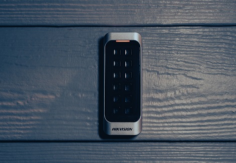 Card reader at entry point — access control integrated with the full security system.