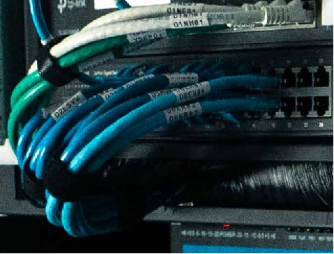 Every cable labeled at both ends, color-coded for instant identification. This is what professional installation looks like.